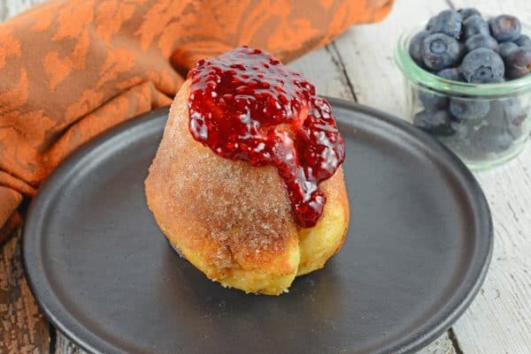 Cinnamon Sugar Popovers 2 Cinnamon Sugar Popovers are easier to make then you think! A crispy outside and chewy inside coated with cinnamon and sugar, then drizzled in a fresh raspberry sauce.