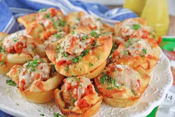 Cheesy Garlic Meatball Bombs 3 Cheesy Garlic Meatball Bombs are tender meatballs on buttery garlic bread and topped with cheese and marinara sauce. Perfect as a snack, appetizer or entree.