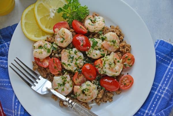 Garlic Butter Shrimp 4 Garlic Butter Shrimp is a quick and easy meal solution that takes only 10 minutes to prepare! Served over wholesome quinoa with garlicky shrimp and tomatoes.