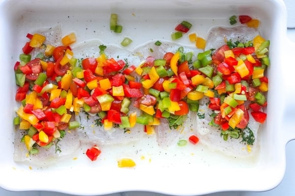 layered halibut fillets ready for baking