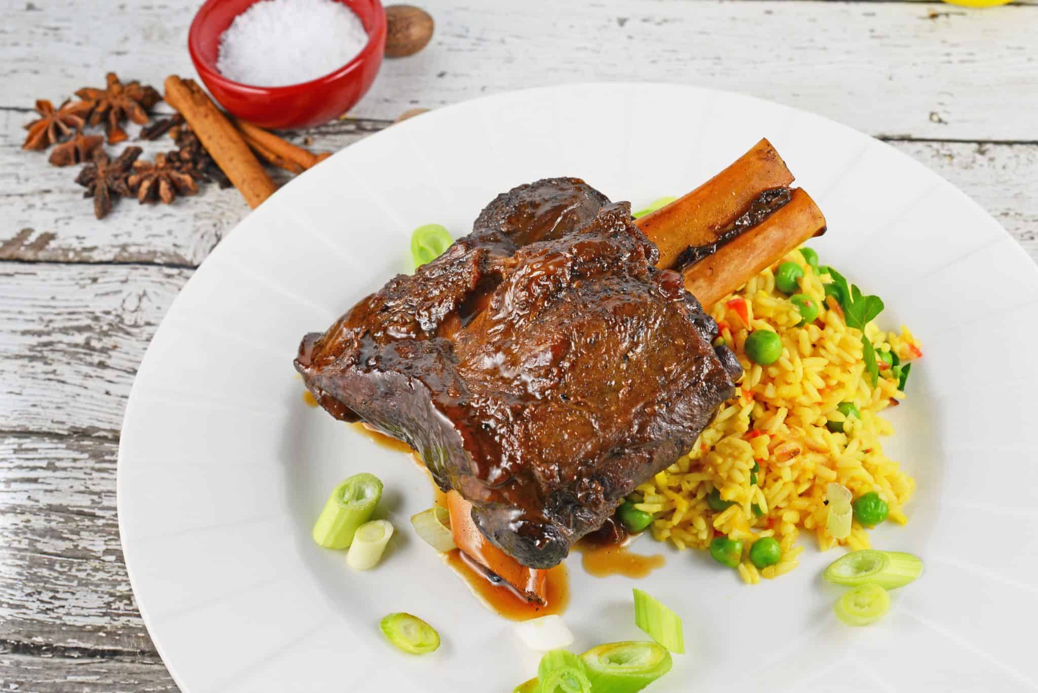 Braised Wild Boar Shanks are a sophisticated and exotic meal, ideal for special occasions and dinner parties. Lean and healthy with loads of rich flavor. #wildboar #braisedwildboar www.savoryexperiments.com