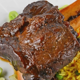 Braised Wild Boar Shanks are a sophisticated and exotic meal, ideal for special occasions and dinner parties. Lean and healthy with loads of rich flavor. #wildboar #braisedwildboar www.savoryexperiments.com