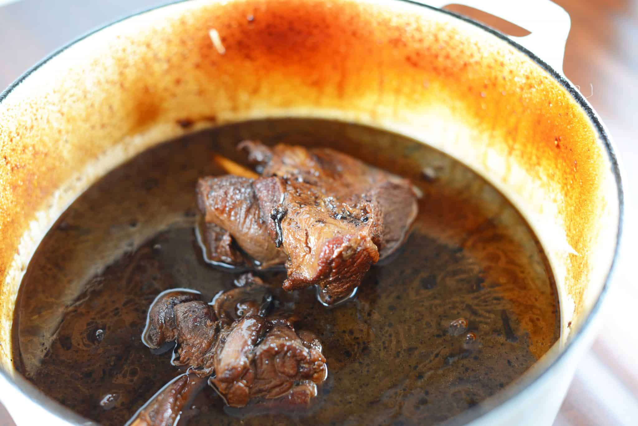 Braised Wild Boar Shanks are a sophisticated and exotic meal, ideal for special occasions and dinner parties. Lean and healthy with loads of rich flavor. #wildboar #braisedwildboar www.savoryexperiments.com