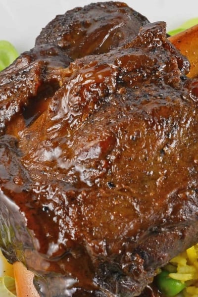 Braised Wild Boar Shanks are a sophisticated and exotic meal, ideal for special occasions and dinner parties. Lean and healthy with loads of rich flavor. #wildboar #braisedwildboar www.savoryexperiments.com