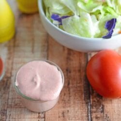 Creamy Tomato Salad Dressing Recipe - this homemade salad dressing can also be used to baste veggies on the grill or as a dipping sauce for a veggie tray. Uses fresh tomatoes with zesty lemon juice and Dijon mustard. www.savoryexperiments.com