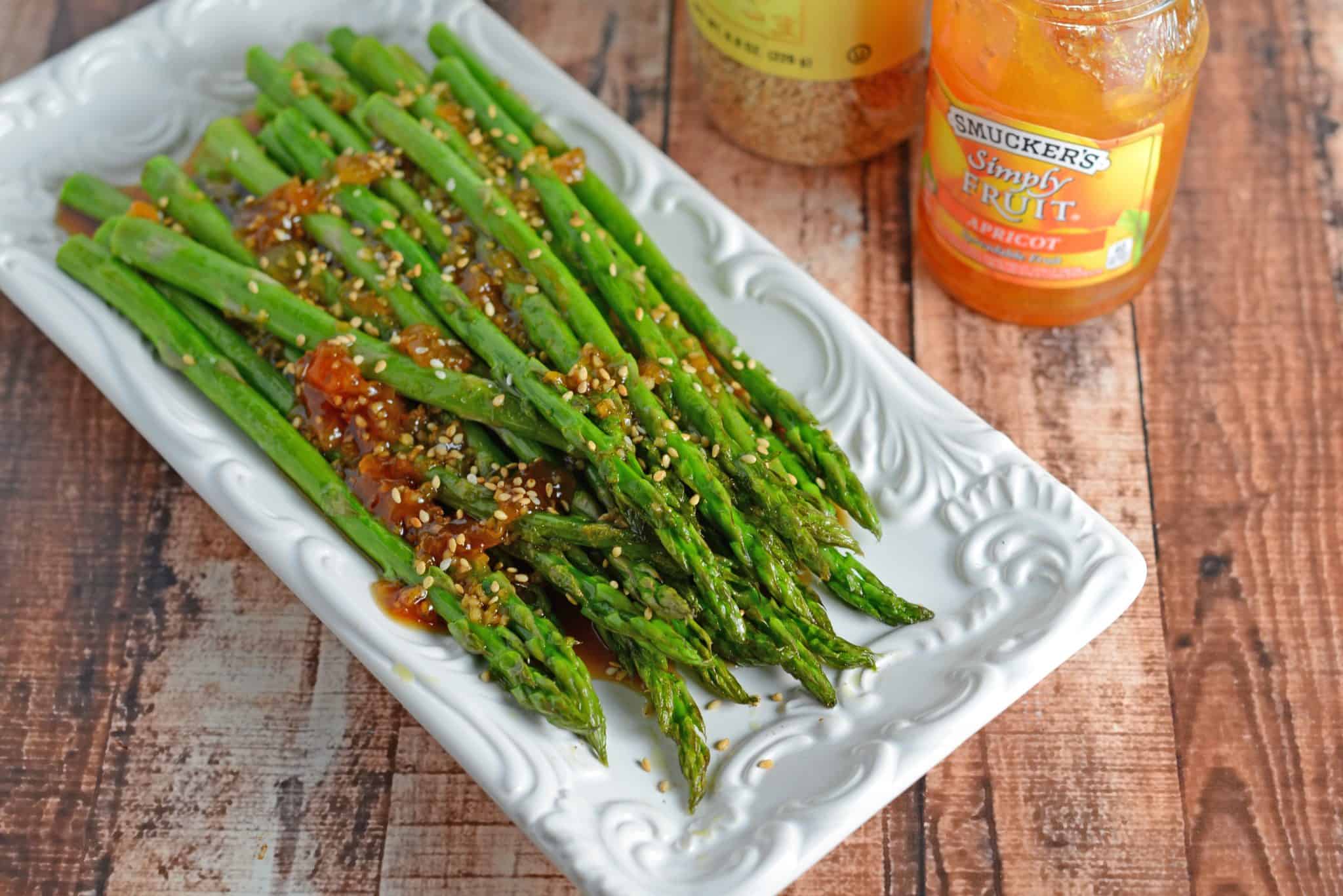 Roasted Asparagus with Apricot Sauce is an easy recipe for asparagus in the oven. The best asparagus side recipe out there! #roastedasparagus #asparagussidedishrecipe www.savoryexperiments.com 