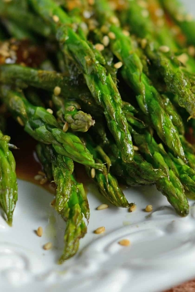 Roasted Asparagus with Apricot Sauce is an easy recipe for asparagus in the oven. The best asparagus side recipe out there! #roastedasparagus #asparagussidedishrecipe www.savoryexperiments.com