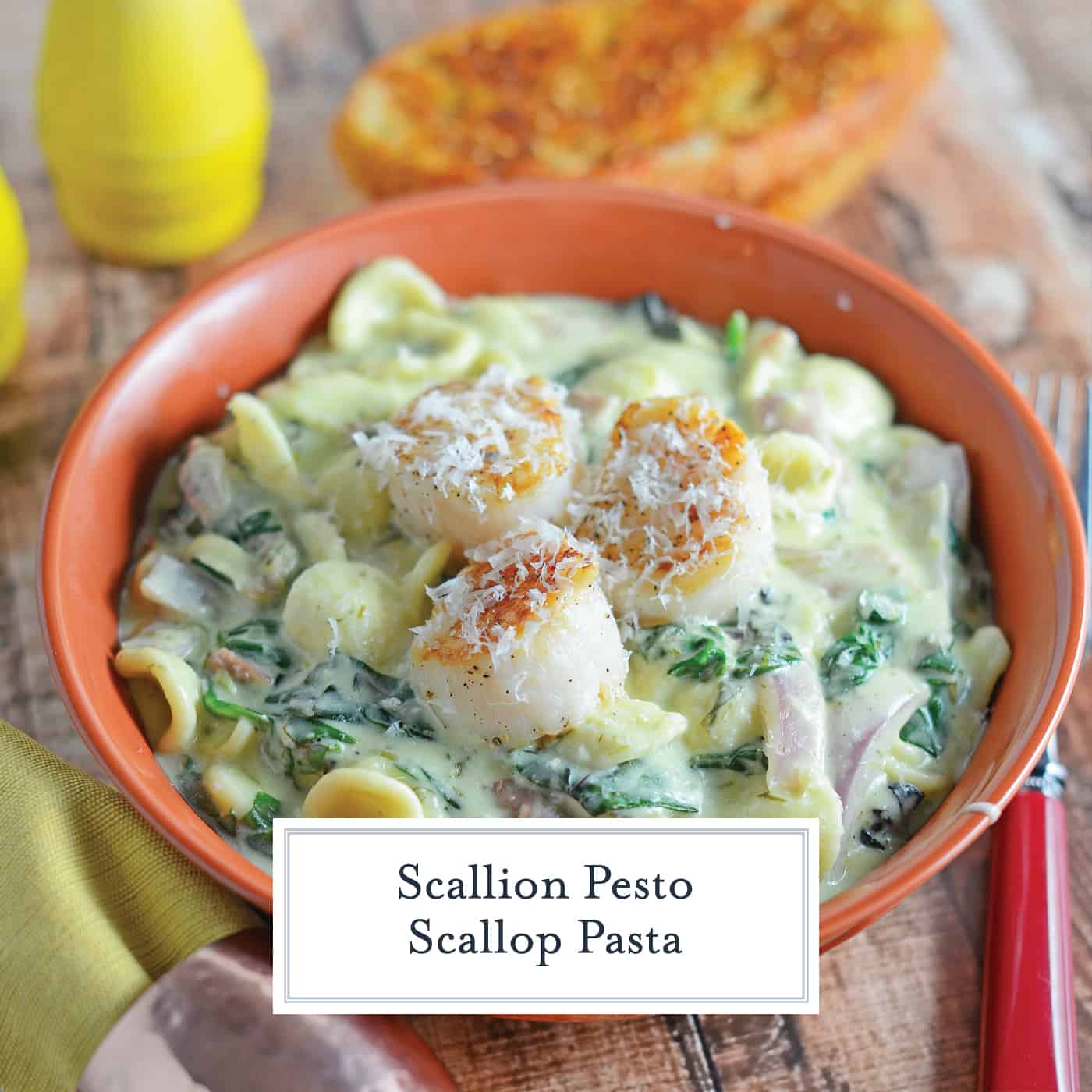 Scallion Pesto Scallop Pasta is a restaurant quality dish, creamy pasta sauce with garlic, Swiss chard, prosciutto and seared scallops. #pastarecipes #scalloprecipes www.savoryexperiments.com