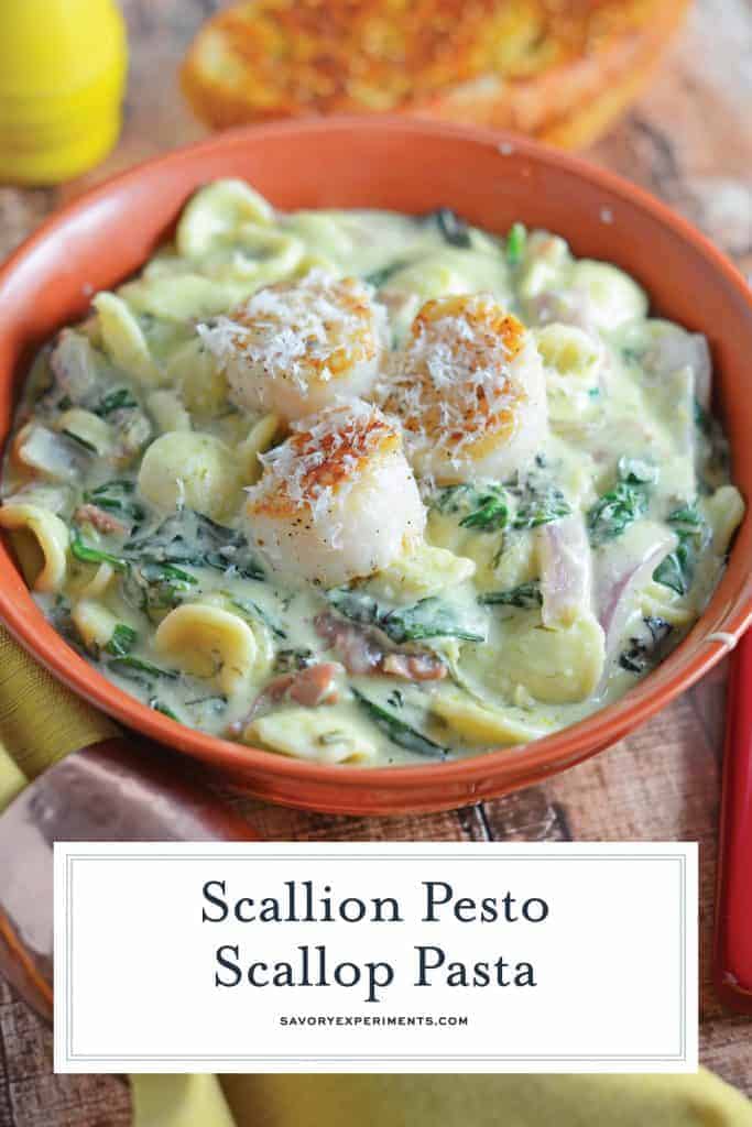 Scallion Pesto Scallop Pasta is a restaurant quality dish, creamy pasta sauce with garlic, Swiss chard, prosciutto and seared scallops. #pastarecipes #scalloprecipes www.savoryexperiments.com