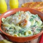 Scallion Pesto Scallop Pasta is a restaurant quality dish, creamy pasta sauce with garlic, Swiss chard, prosciutto and seared scallops. #pastarecipes #scalloprecipes www.savoryexperiments.com