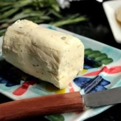 Roasted Garlic Rosemary butter on a small plate