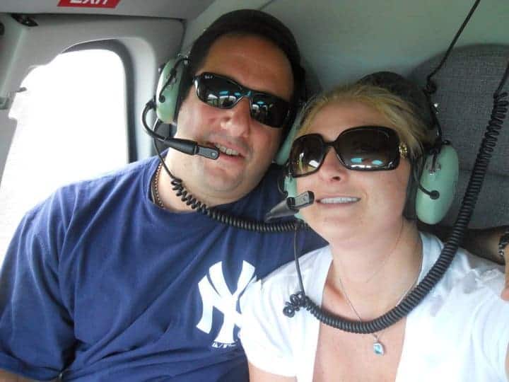 A person wearing sunglasses posing for the camera