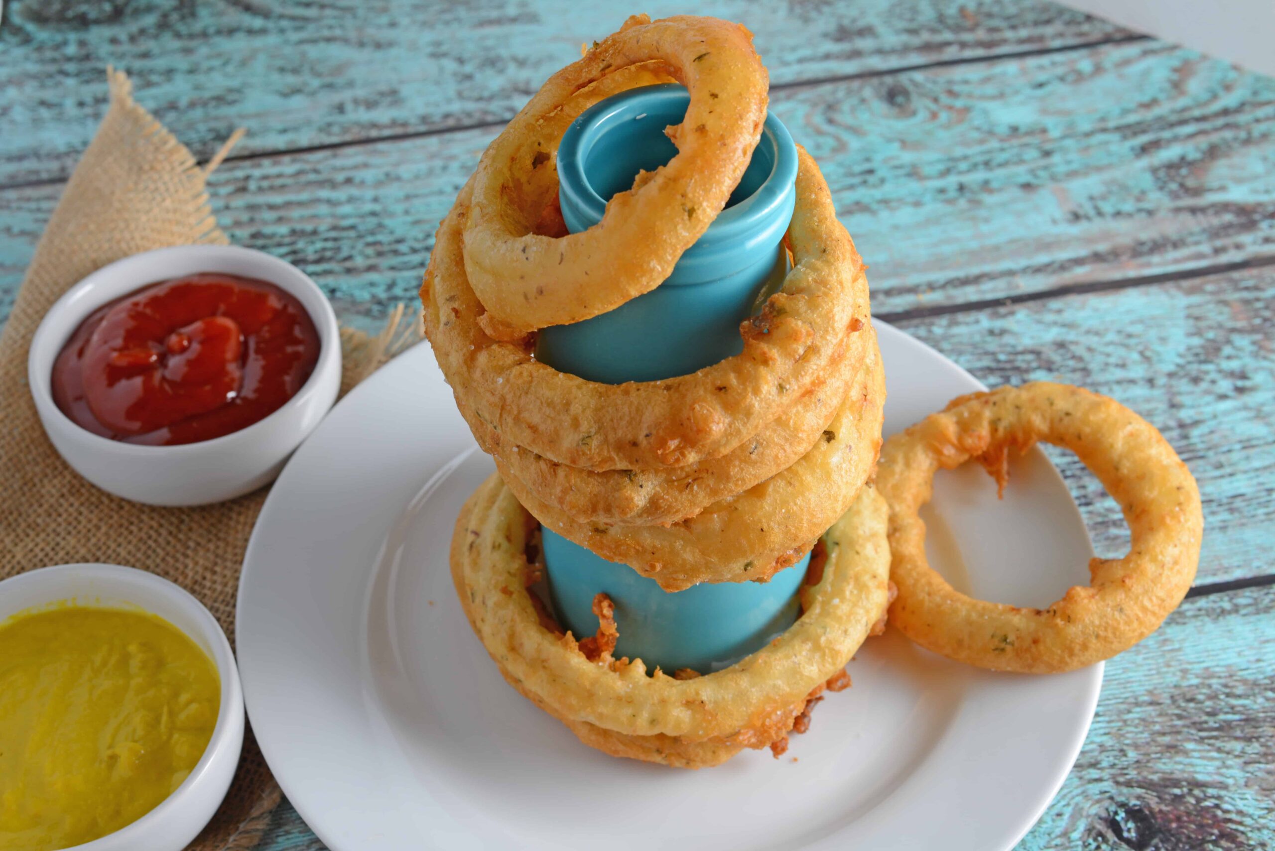 beer battered onion rings on blue bottle