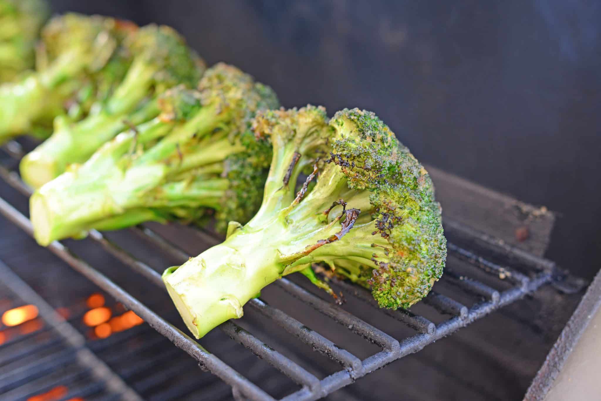 Garlic Grilled Broccoli is an excellent side dish for grilled meals. Marinate in a garlic and spice mix and then char on the grill for great flavor!