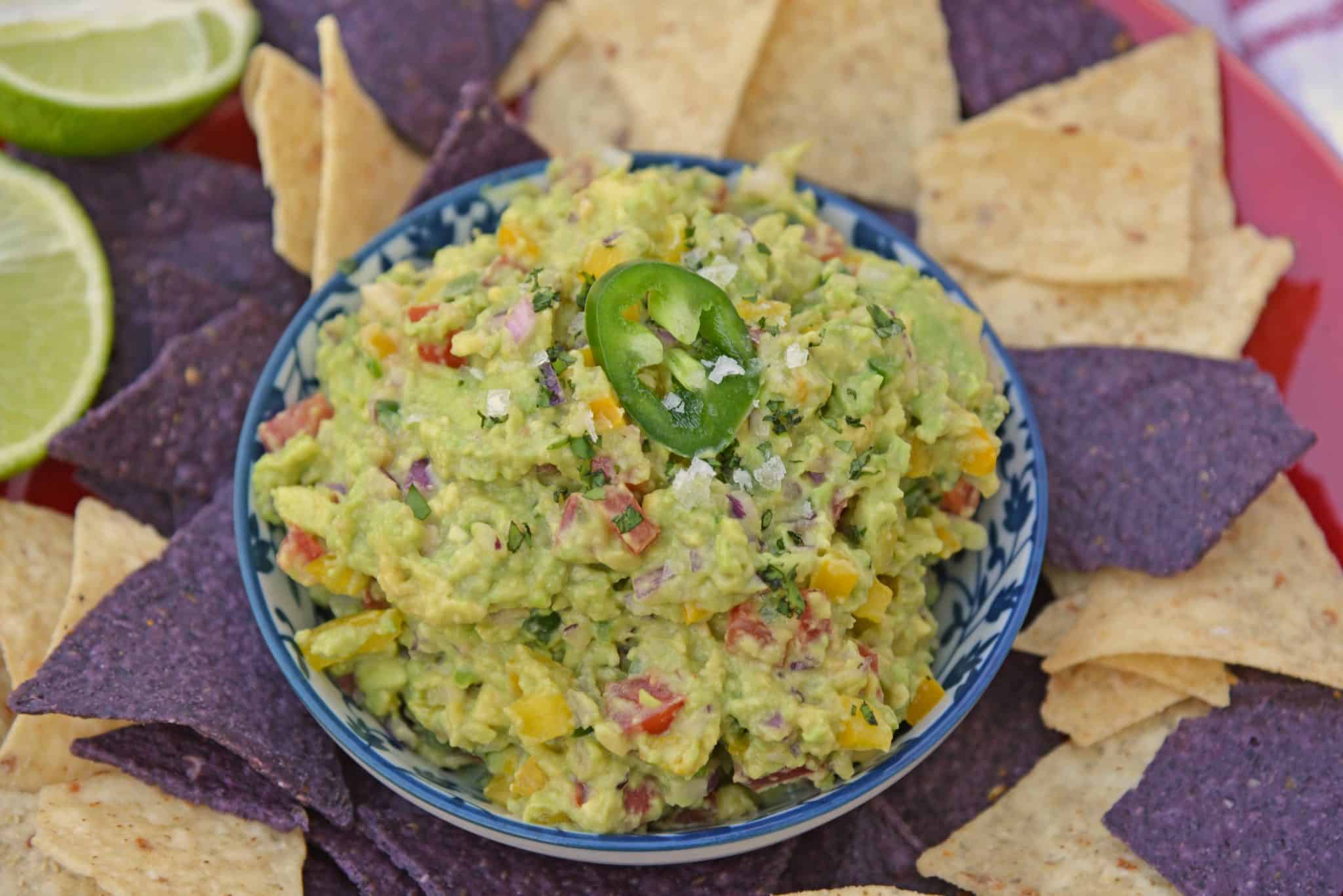 This Homemade Guacamole is one of the Best Guacamole Recipe you'll find! It's an easy guacamole recipe that is perfect for pairing with chips, fish, chicken, beef, salad or any food that needs a little pick-me-up! #bestguacamolerecipe #easyguacamolerecipe #homemadeguacamole www.savoryexperiments.com