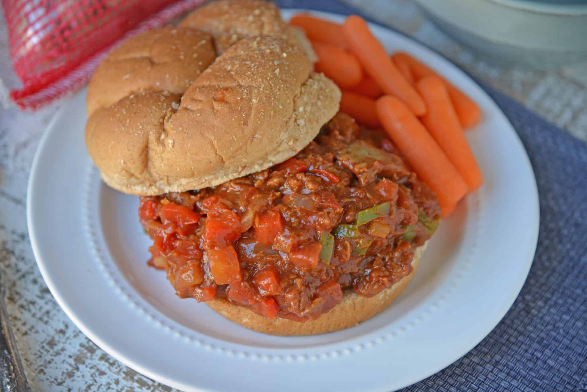 This semi-homemade Pulled Pork Sandwich is a quick and easy kid friendly option! It's an easy pulled pork recipe that will be ready in just 15 minutes! #pulledporksandwich #semihomemade #easypulledporkrecipe www.savoryexperiments.com