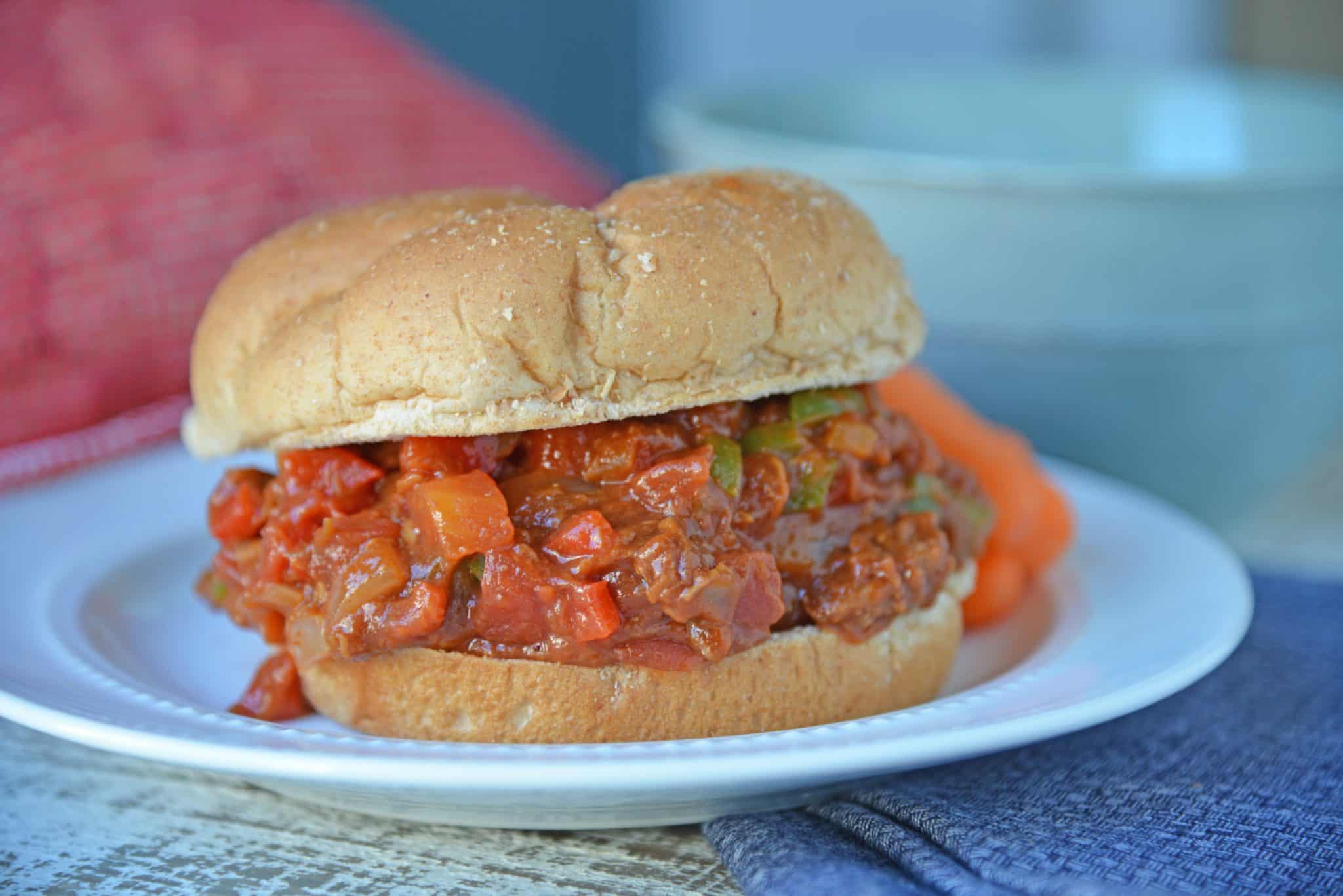 This semi-homemade Pulled Pork Sandwich is a quick and easy kid friendly option! It's an easy pulled pork recipe that will be ready in just 15 minutes! #pulledporksandwich #semihomemade #easypulledporkrecipe www.savoryexperiments.com