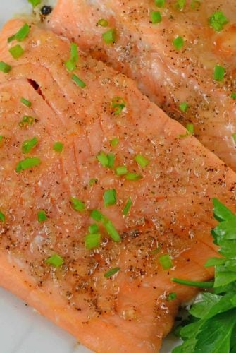 Apple Roasted Salmon is one of my favorite healthy and quick dinners. This recipe is perfect for busy families who need a tasty dinner fast! #bakedsalmon #easysalmonrecipes www.savoryexperiments.com