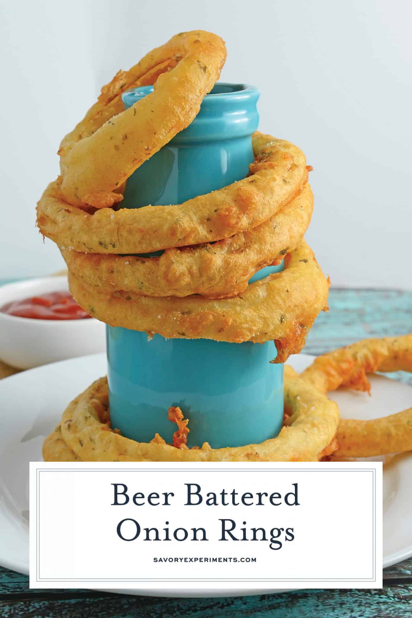 Beer Battered Onion Rings gives you crunchy and crispy homemade beer battered onion rings. Dip them in a spicy chipotle remoulade or enjoy them alone. #homemadeonionrings #friedonionrings #beerbatteredonionrings www.savoryexperiments.com