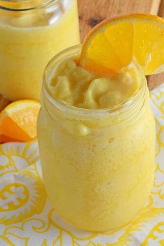 Copycat Orange Julius is the REAL recipe they use at the store! A frothy, frozen orange drink that is perfect for sipping on a hot day.