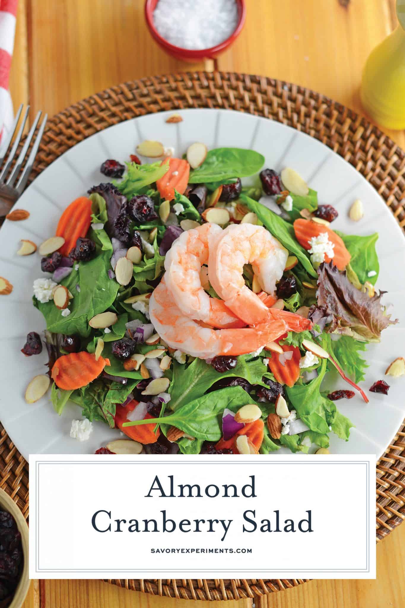 This Almond Cranberry Salad with Dijon Vinaigrette is a quick yet tasty meal solution! Throw it together for a healthy quick dinner or lunch! #summersalads #cranberrysalad #easysaladrecipes www.savoryexperiments.com