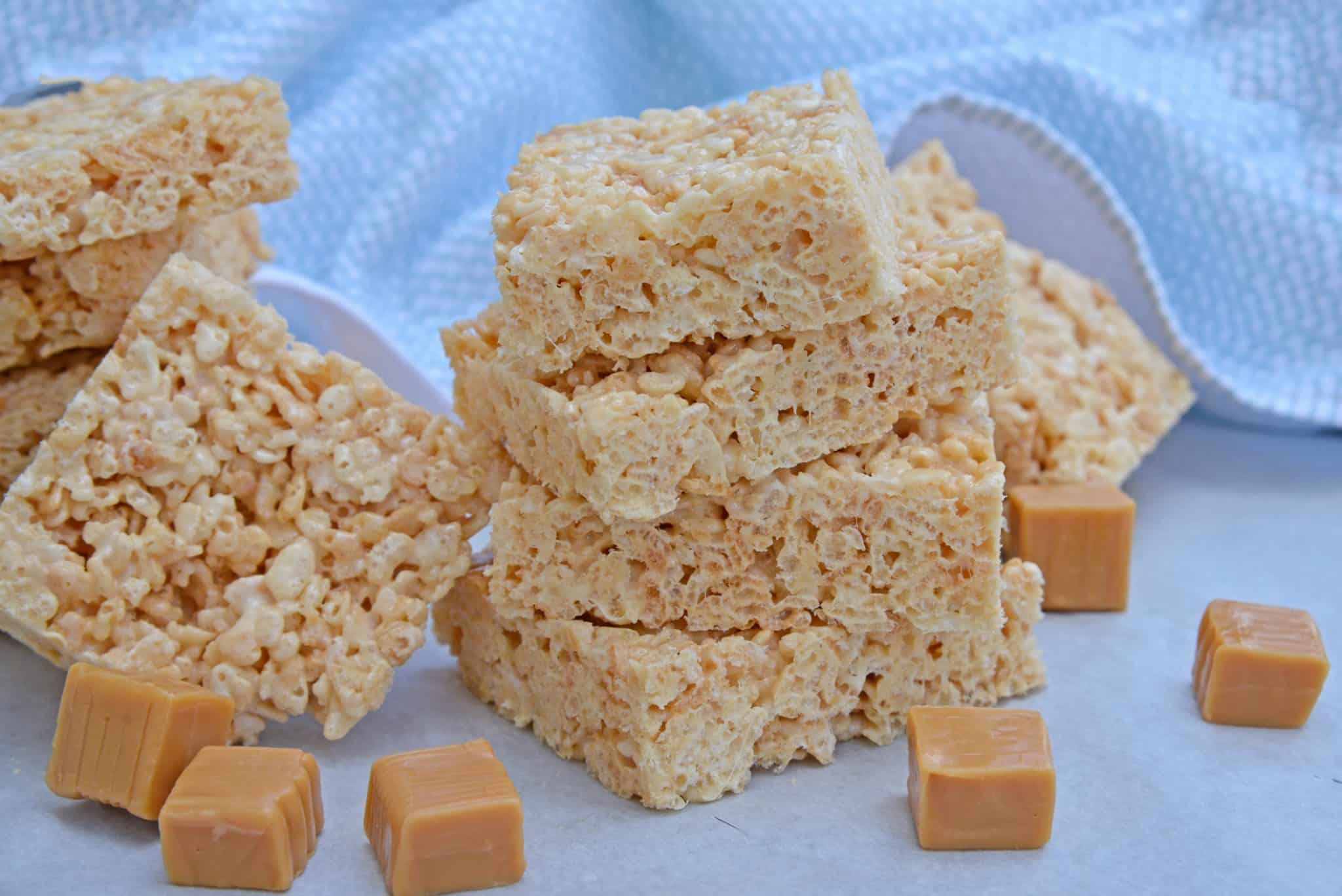 Caramel Rice Krispie Treats are a new twist on an old favorite! These homemade Rice Krispie Treats are so good and miles better then the store bought ones! #ricekrispietreats #ricekrispiebars www.savoryexperiments.com