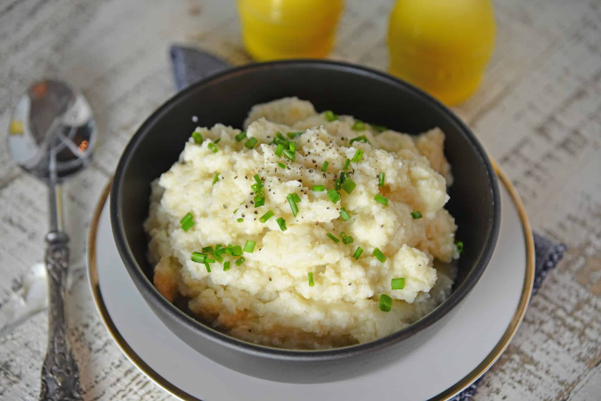 Mashed Cauliflower is a healthier alternative to mashed potatoes, with fewer carbs! This Mashed Cauliflower recipe is perfectly smooth and creamy! #mashedcauliflower #cauliflowermashedpotatoes www.savoryexperiments.com