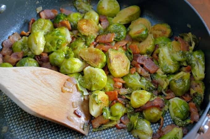Brussels Sprouts with Bacon Recipe - Think you don't like brussels sprouts? This Brussel sprouts recipe will change your mind!! BEST brussels sprouts ever! Great dinner side dish! www.savoryexperiments.com