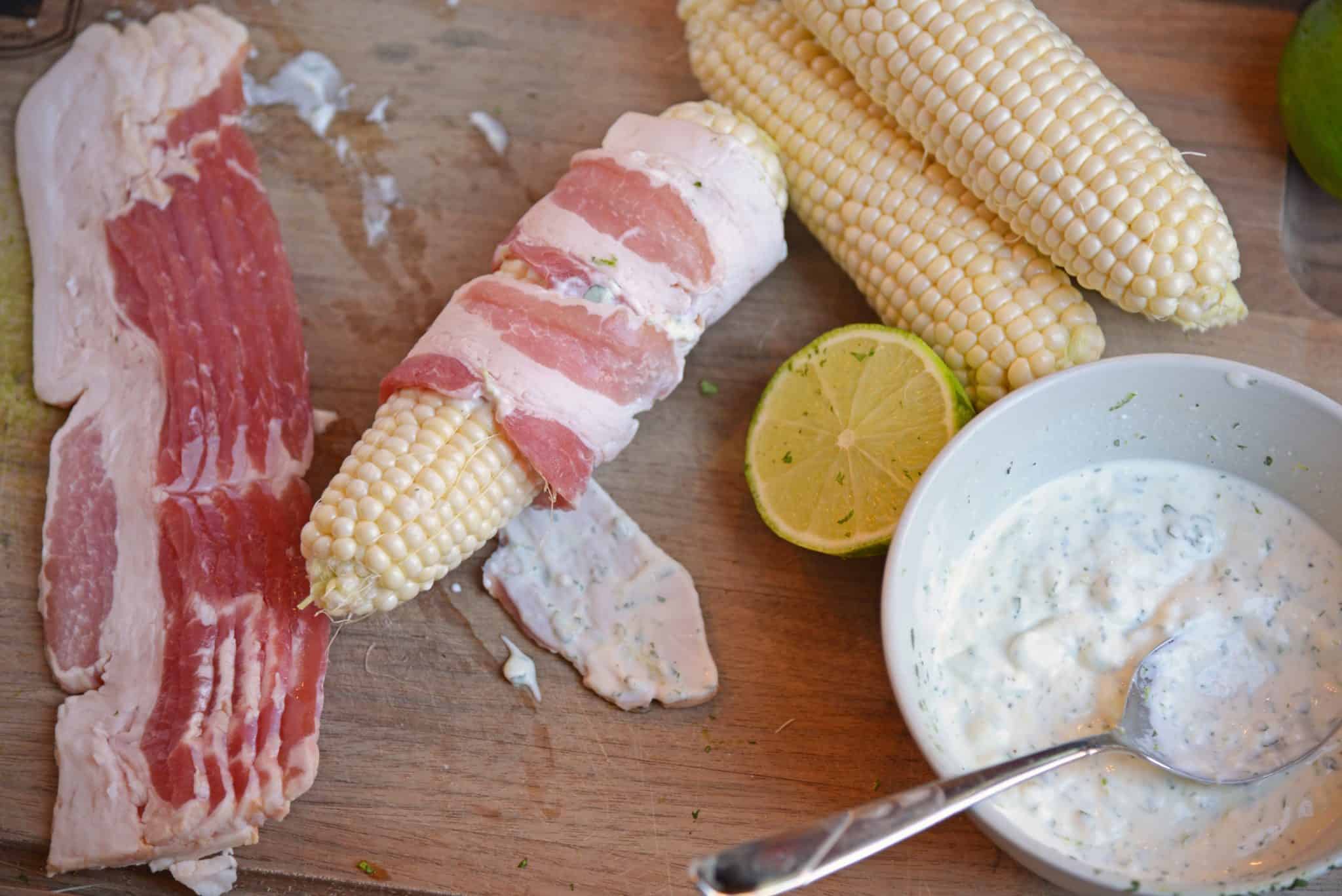 Cilantro Lime Bacon Wrapped Corn is a zesty grilled corn side dish that is perfect for any summer BBQ or Mexican fiesta! A sweet & zesty flavor combination! #grilledcorn #baconwrappedcorn #mexicancorn www.savoryexperiments.com