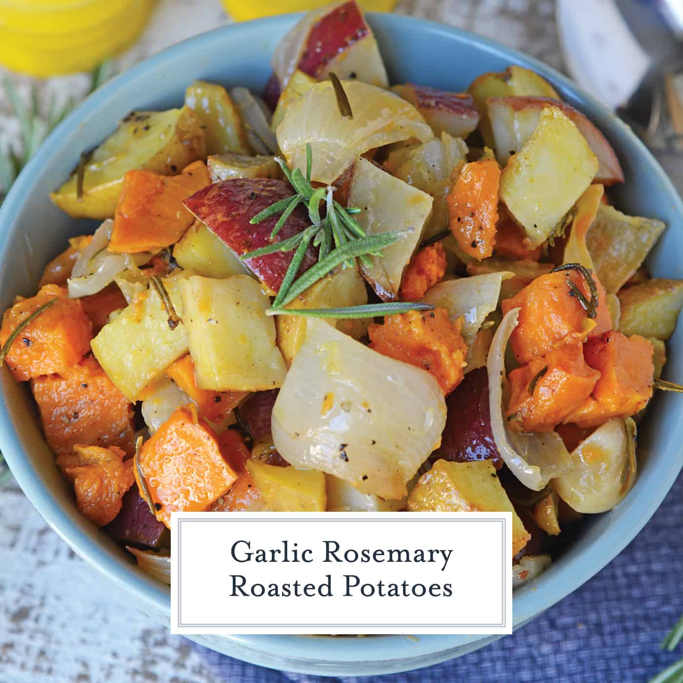 Garlic Roasted Potatoes with Rosemary are a mix of sweet and Yukon gold potatoes baked to a golden brown with olive oil, fresh rosemary, garlic and sweet onion! #ovenroastedpotatoes #garlicroastedpotatoes #potatorecipes www.savoryexperiments.com