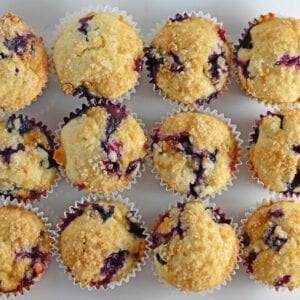 Classic Blueberry Muffins with a Streusel Crumble Topping - super easy recipe for super soft muffins. Perfect for any breakfast or brunch. www.savoryexperiments.com