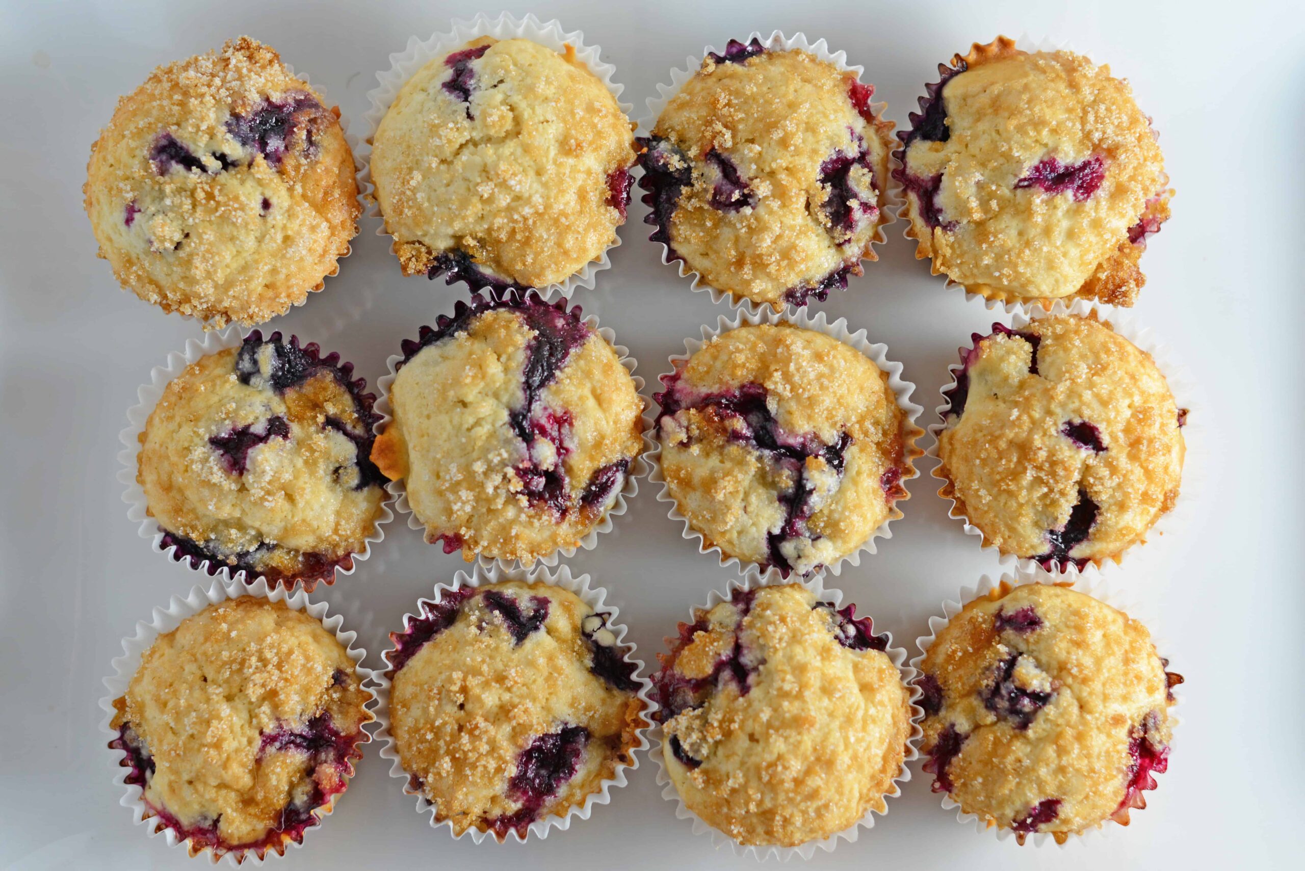 Classic Blueberry Muffins with a Streusel Crumble Topping - super easy recipe for super soft muffins. Perfect for any breakfast or brunch. www.savoryexperiments.com