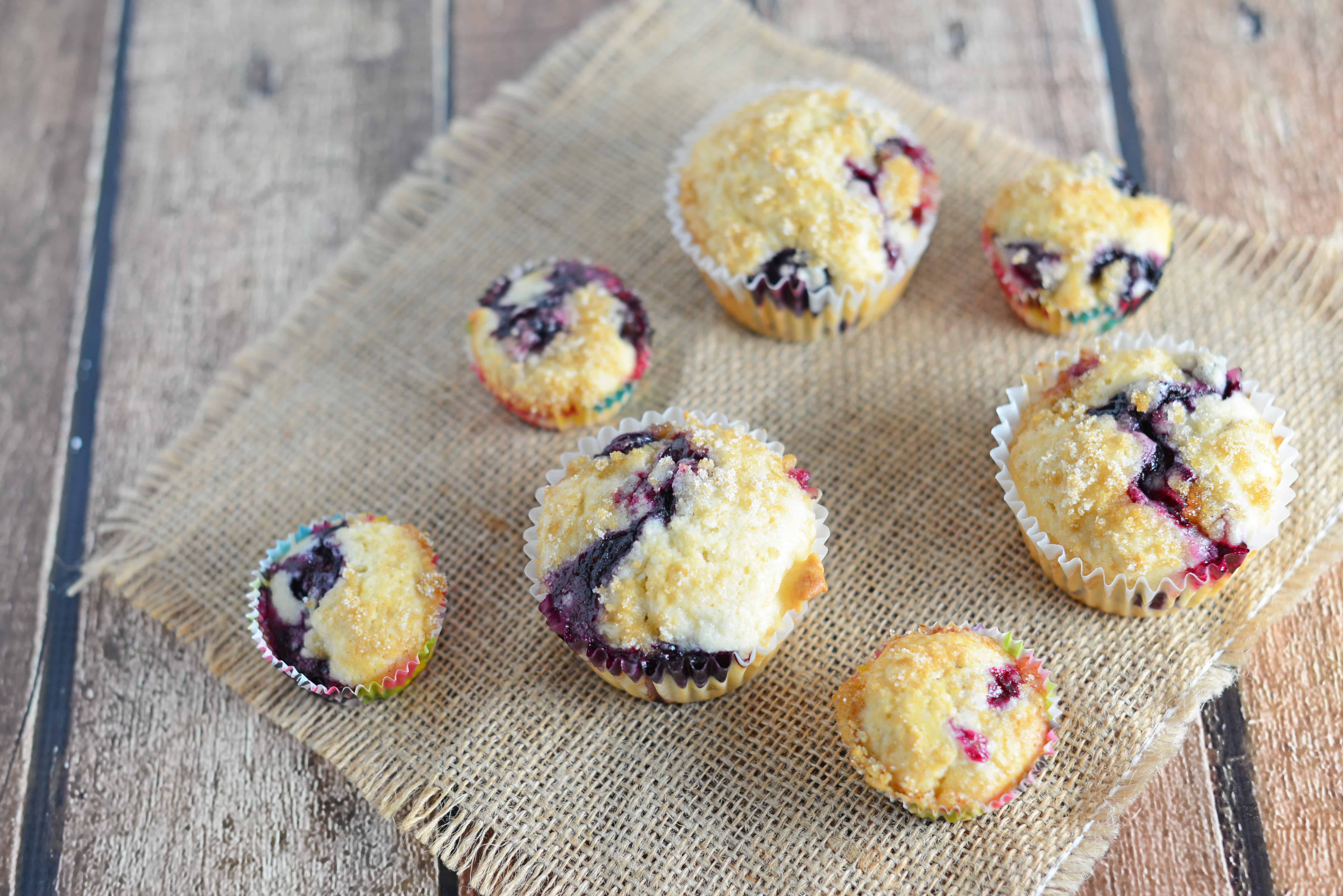 Classic Blueberry Muffins with a Streusel Crumble Topping - super easy recipe for super soft muffins. Perfect for any breakfast or brunch. www.savoryexperiments.com