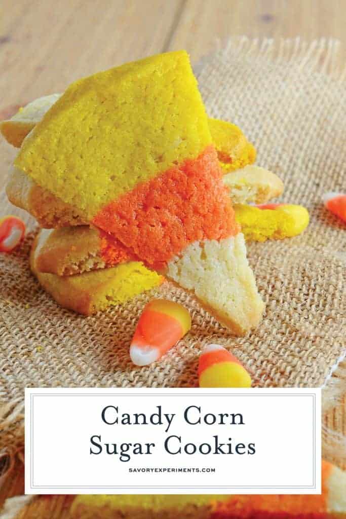 Candy Corn Sugar Cookies are the perfect Halloween Cookie! These festive and easy to make Halloween treats are perfect for any costume party! #halloweencookies #halloweendesserts #halloweensugarcookies www.savoryexperiments.com