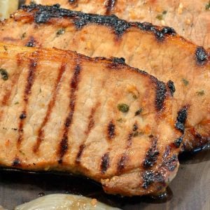 Onion Soup Mix Grilled Pork Chops is a easy pork chop recipe. Its wonderful when you can find a recipe that doesn't take too much time out of your day. #grilledporkchops #easyporkchoprecipes #grillingporkchops www.savoryexperiments.com