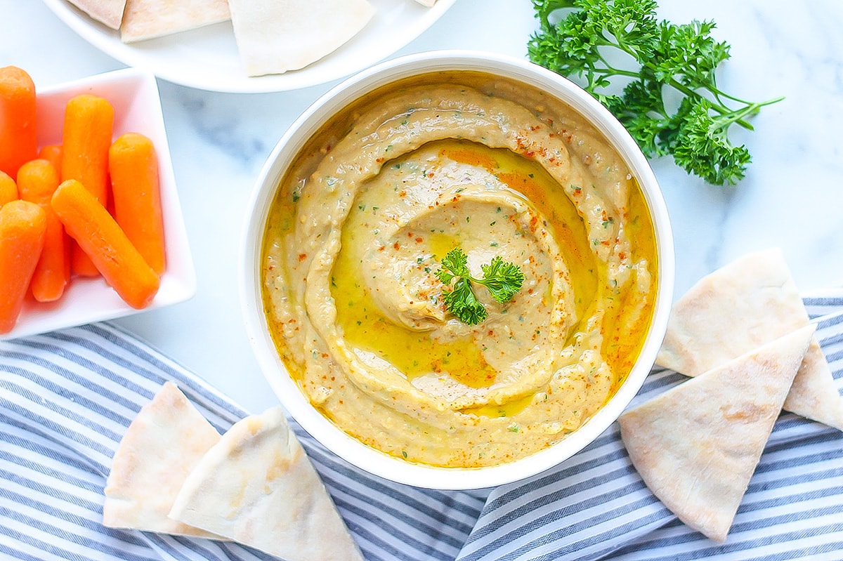 overhead of baba ganoush with dippers