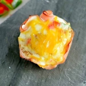 Get ready for these Western Egg Muffins to be your favorite type of Breakfast Eggs. Whether you are eating these baked egg cups at home or on the road, they are sure to be delicious! #bakedeggcups #breakfasteggs #eggmuffins www.savoryexperiments.com