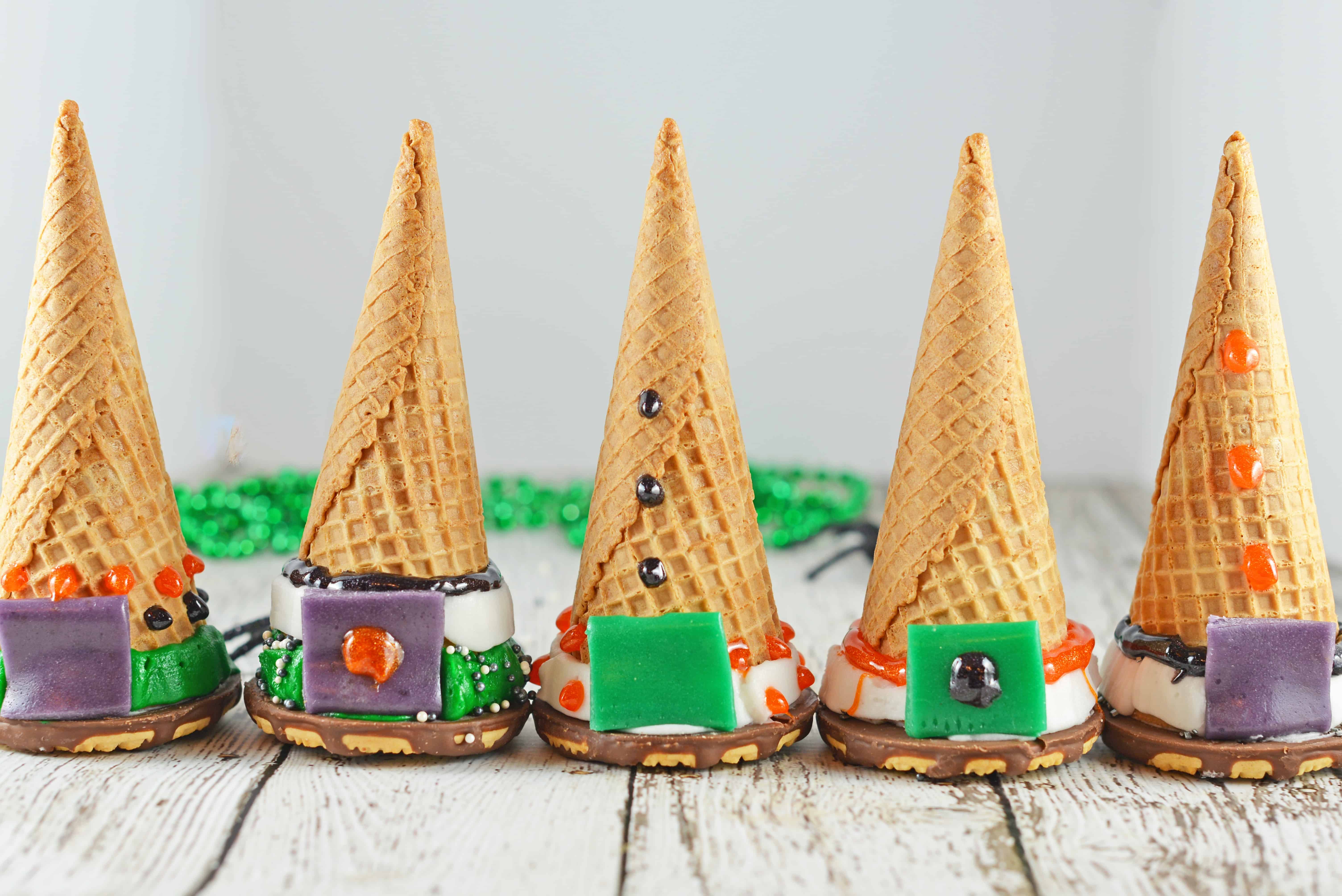 Cake Cone Witch Hats are the perfect Halloween activity for kids! Bake cake into a waffle cone, cap it with a cookie and let them decorate their own treat!