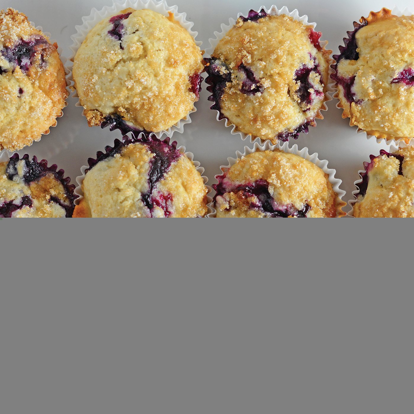 Homemade Blueberry Muffins with Crumb Topping is a super easy recipe for super soft muffins! They're delightfully light and full of flavor!  #homemadeblueberrymuffins #bestblueberrymuffins www.savoryexperiments.com
