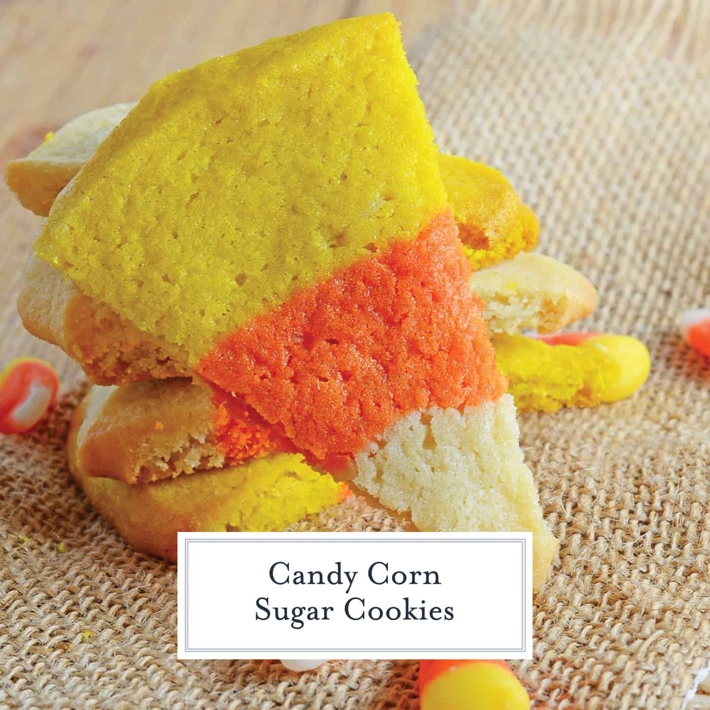 Candy Corn Sugar Cookies are the perfect Halloween Cookie! These festive and easy to make Halloween treats are perfect for any costume party! #halloweencookies #halloweendesserts #halloweensugarcookies www.savoryexperiments.com