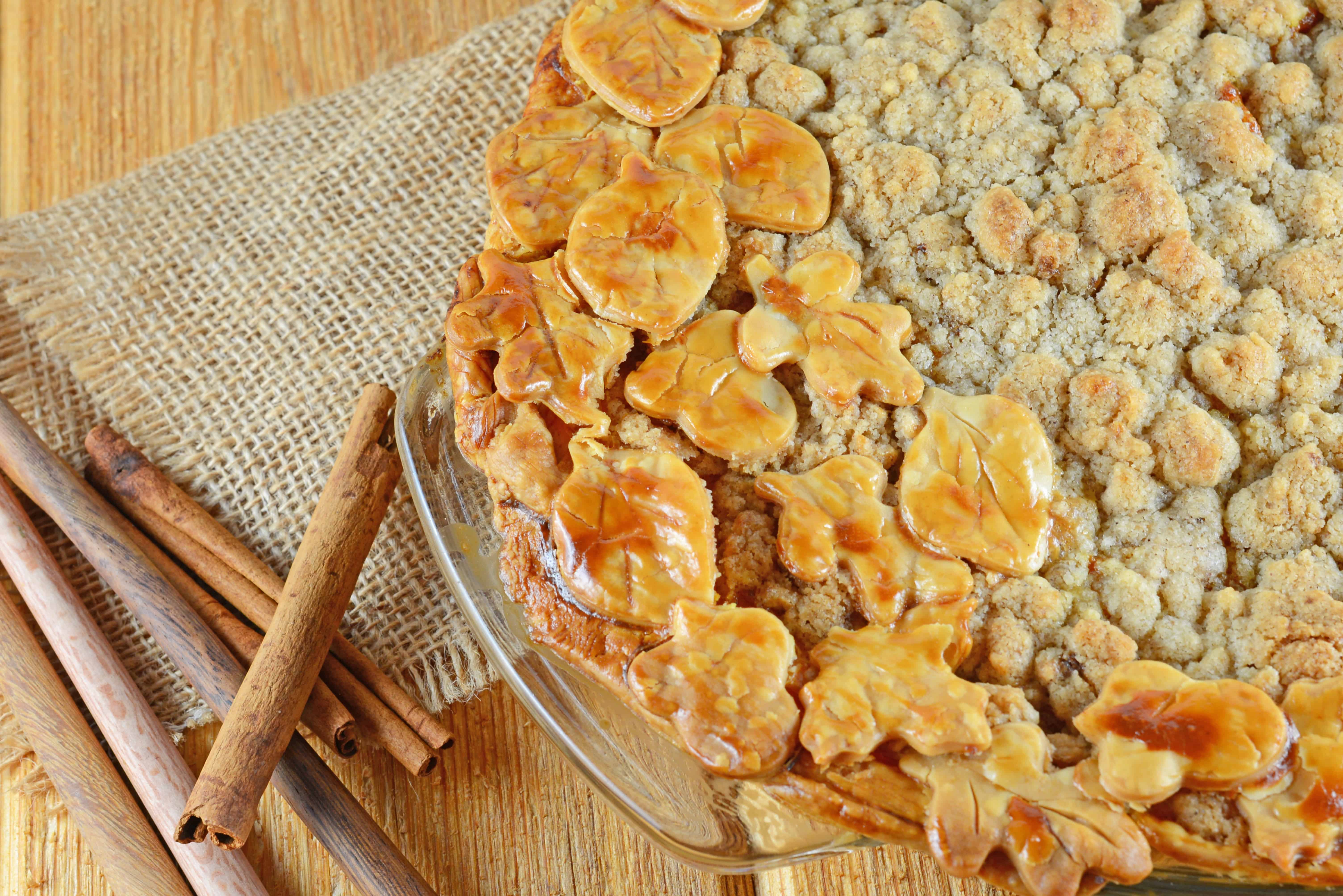 Pumpkin Apple Pie is the best of both worlds! Pumpkin pie and apple pie merged together in a pecan crust with streusel topping.