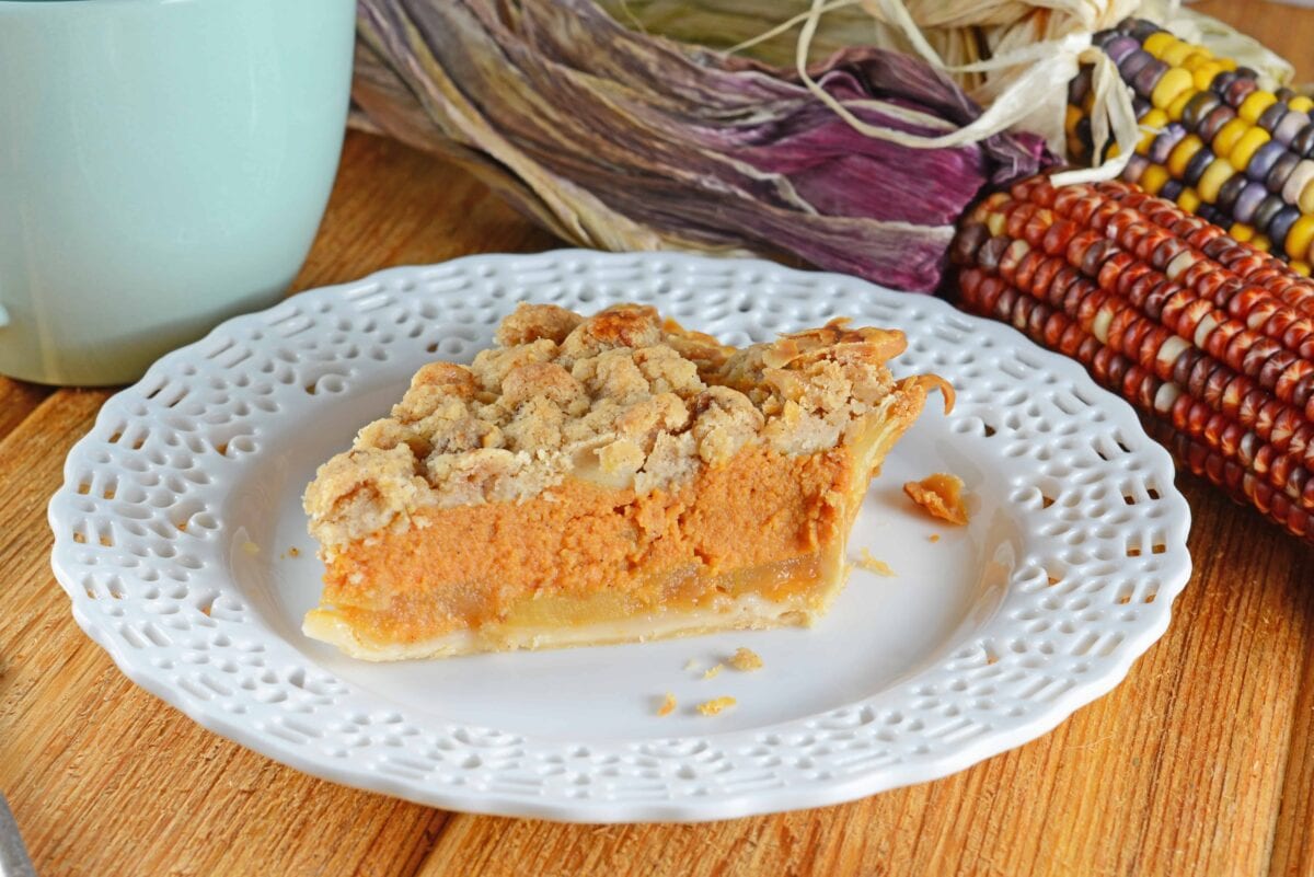 Pumpkin Apple Pie is the best of both worlds! Pumpkin pie and apple pie merged together in a pecan crust with streusel topping.