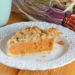 Pumpkin Apple Pie is the best of both worlds! Pumpkin pie and apple pie merged together in a pecan crust with streusel topping.