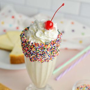 angle of cheesecake milkshake with whipped cream