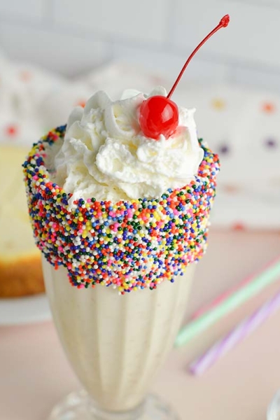 angle of cheesecake milkshake with whipped cream