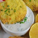 Fried Green Tomatoes are a Southern tradition! This Fried Green Tomatoes Recipe is made up of juicy tomatoes coated with cornmeal, and fried to a golden brown! #friedgreentomatoesrecipe #howtomakefriedgreentomatoes www.savoryexperiments.com