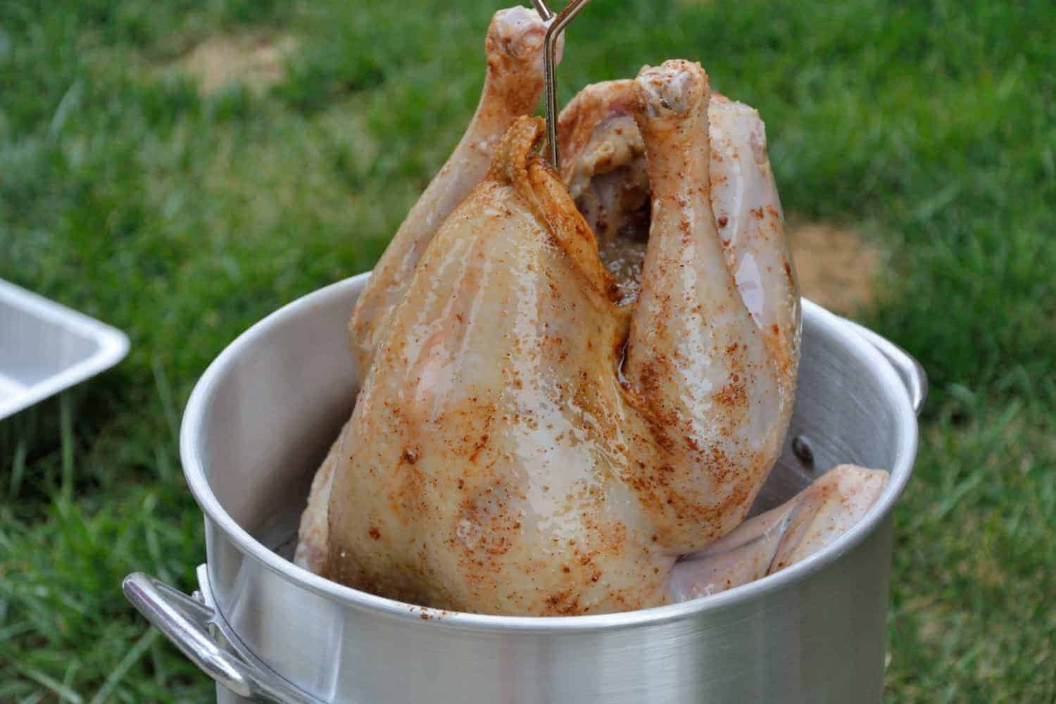 How to Fry a Turkey Step-by-Step Fried Turkey Recipe - Have you ever wondered how to fry a turkey? Here are easy step-by-step instructions that can be used with any fried turkey recipe.  #howtofryaturkey