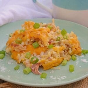 Hash Brown Casserole is great breakfast or brunch dish made with hash browns, onions, bacon and cheese. A delicious make ahead dish everyone will love! #funeralpotatoes #hashbrowncasseroles #potatohotdish www.savoryexperiments.com