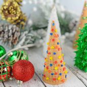 Christmas Tree Cake Cones are filled with cake and frosting and then festively decorated and a fun holiday activity for kids.