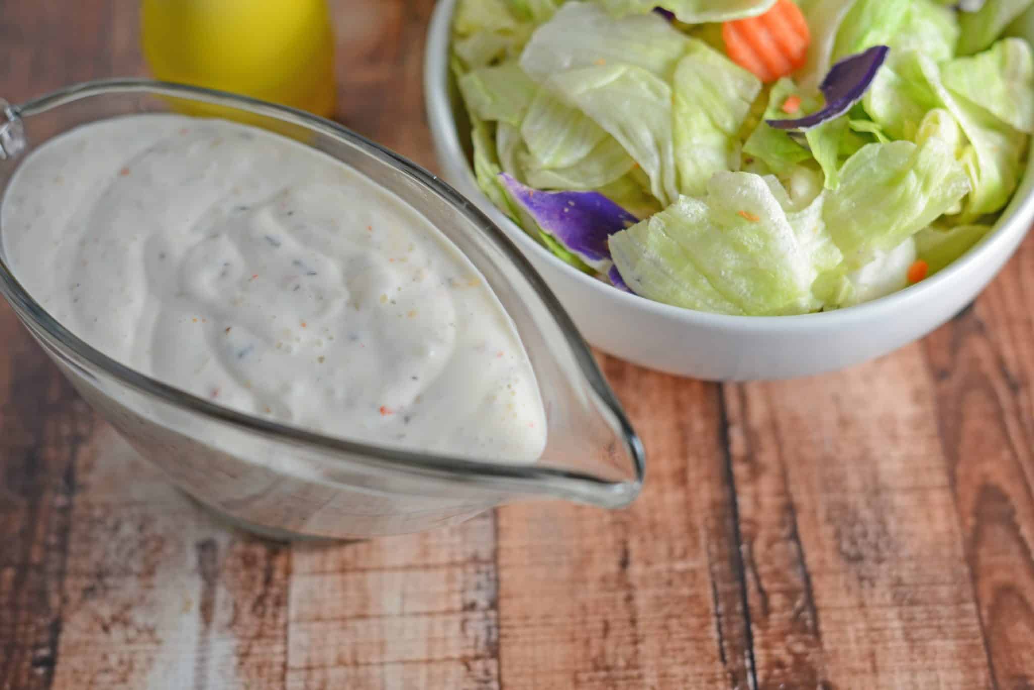 Creamy Italian Dressing a creamy, zesty Italian dressing that you will fall in love with. In 10 minutes or less you can have a homemade Italian dressing. #homemadeitaliandressing #creamyitaliandressing #italiandressingrecipe www.savoryexperiments.com